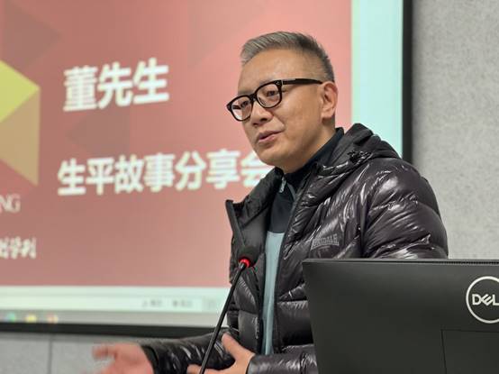 a person wearing glasses  description automatically generated with low confidence